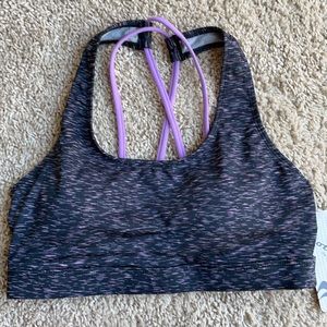 Large purple sports bra, by motion by coalition.